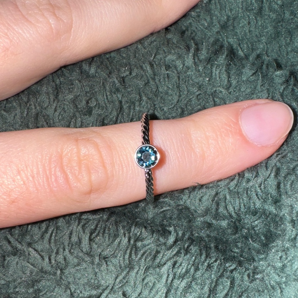 Ring with blue stone